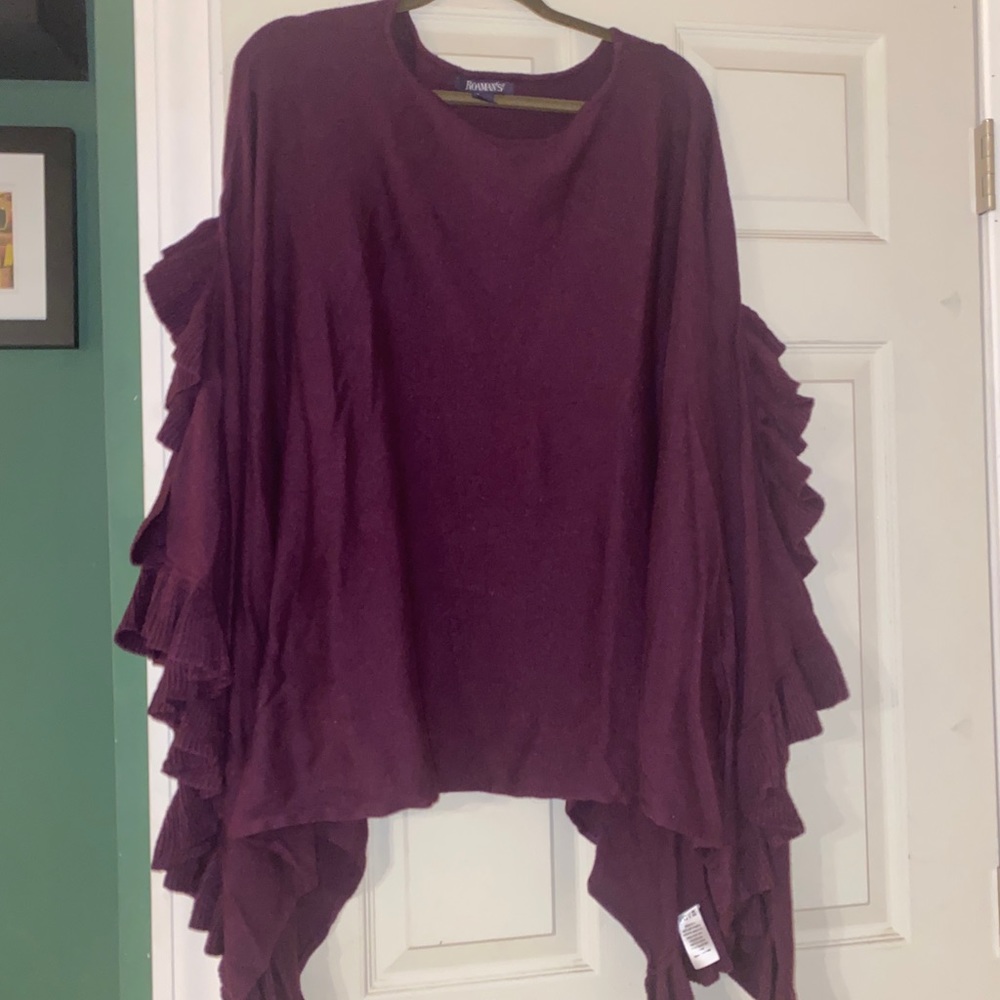 Roaman’s purple poncho